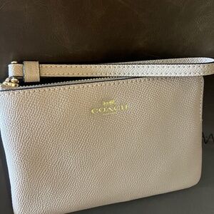 Coach wristlet (small) in taupe